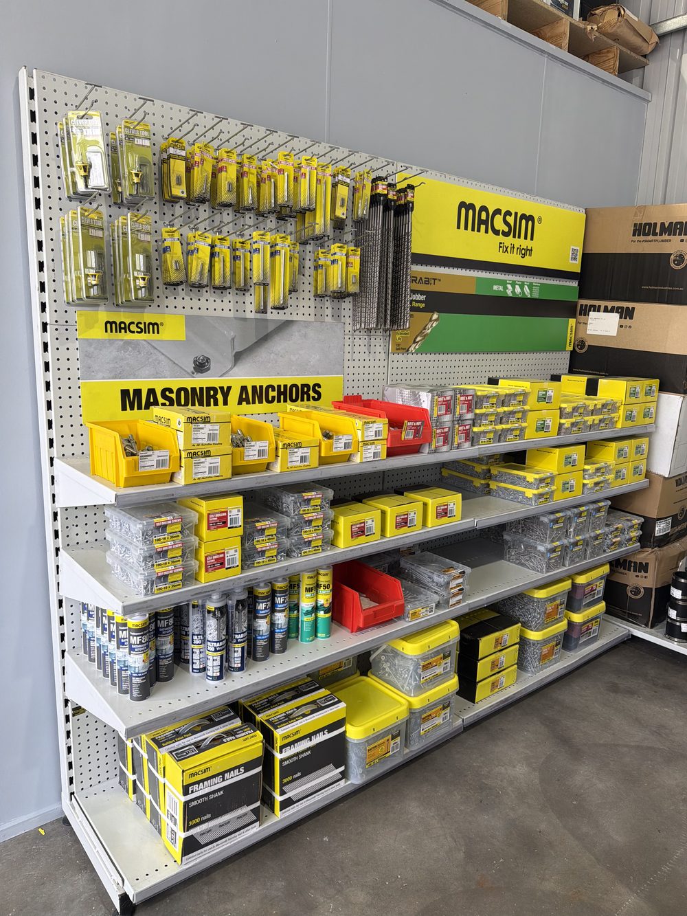 Masonry anchors, framing nails and fixings on the shelves